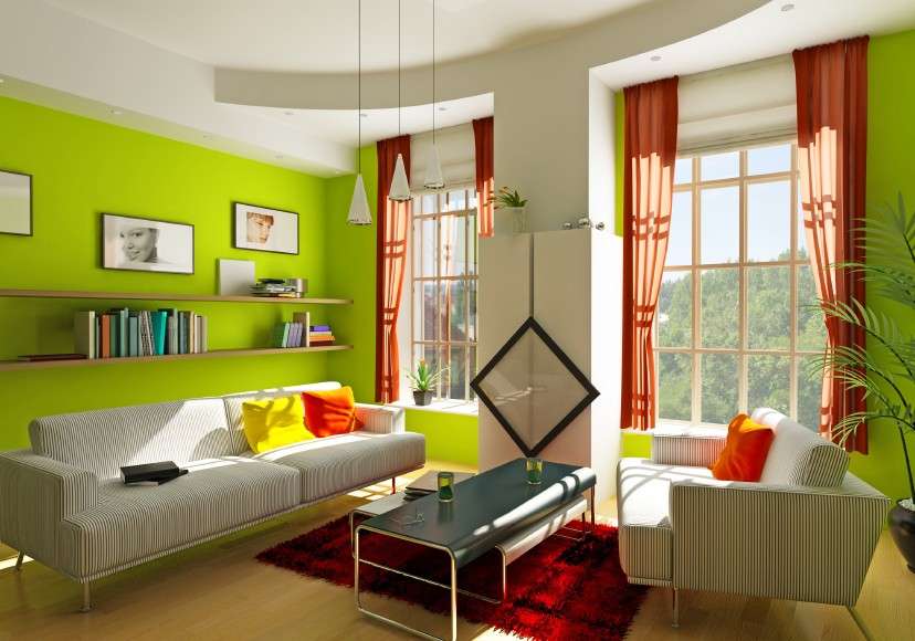 Pareti verdi e divani chiari
