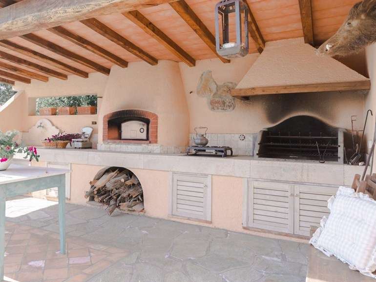Veranda coperta con cucina