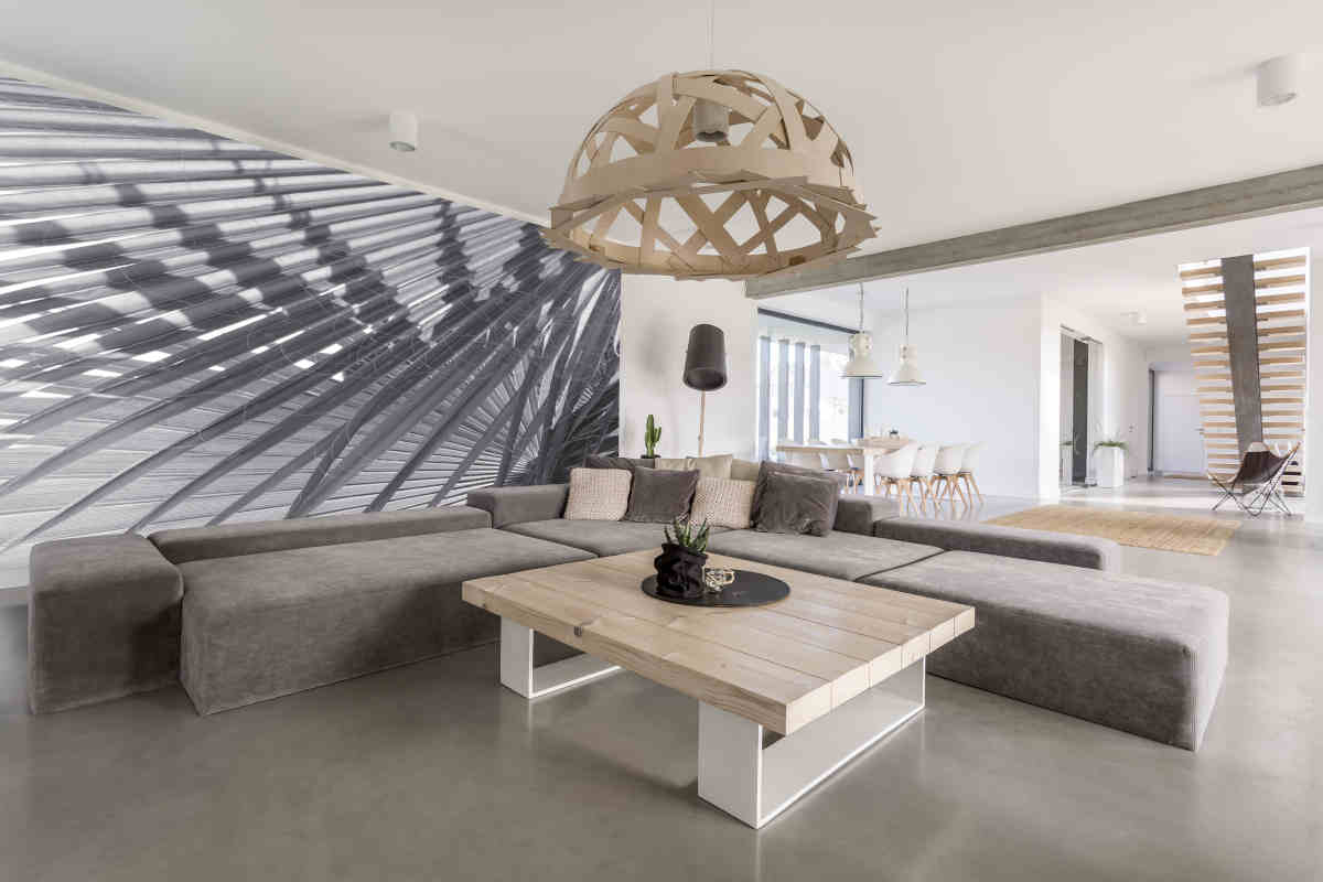 soggiorno open space in casa arredata in stile minimal