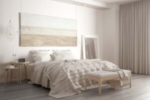 camera da letto in stile scandinavo con mobili in legno chiaro