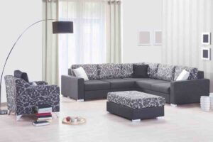 divano ad angolo con poltrona e pouf