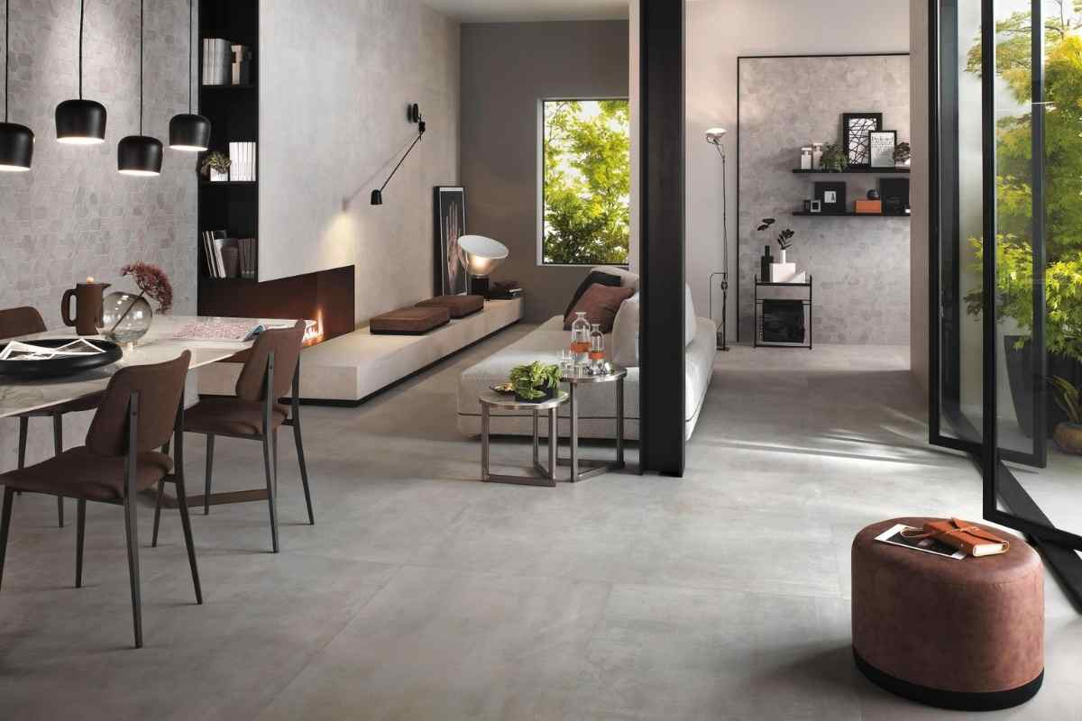 Gres porcellanato effetto cemento in soggiorno moderno su pareti e pavimento