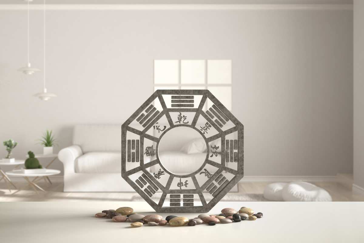 simbolo feng shui e soggiorno sullo sfondo