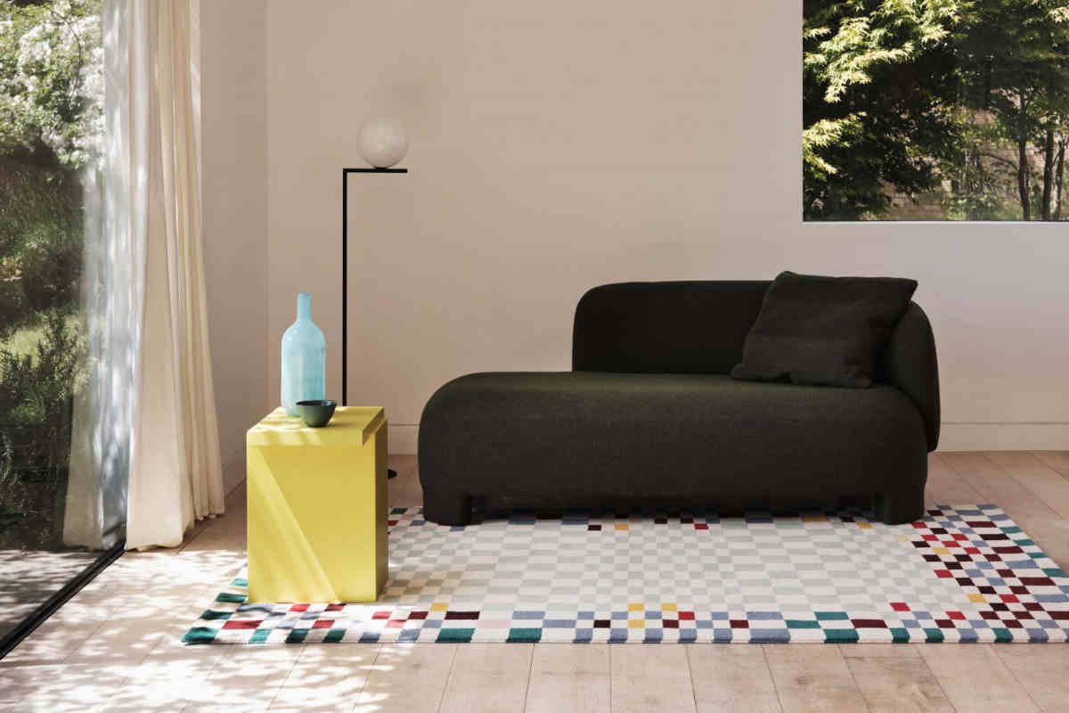 sofa on carpet by Kangan Arora