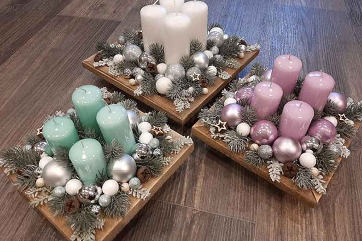 composizioni natale con candele colorate