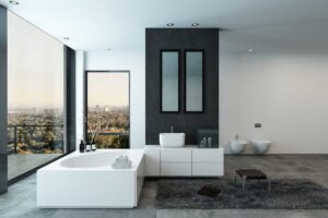 bagno minimal con vasca e lavabo d'appoggio