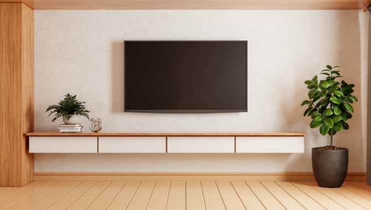 TV console in the living room: tricks 