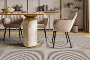 tavolo in legno con gambe cilindriche in marmo e poltroncine arrotondate