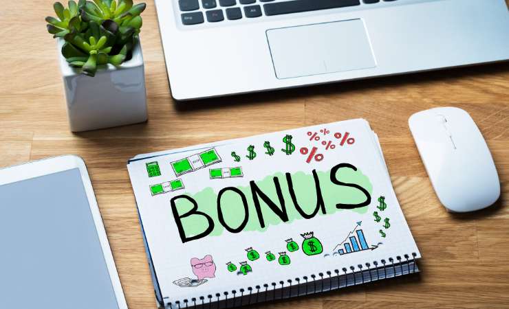 Quaderno aperto con la scritta bonus