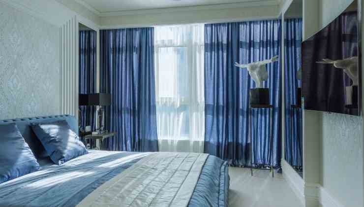 Tende oscuranti in camera da letto blu
