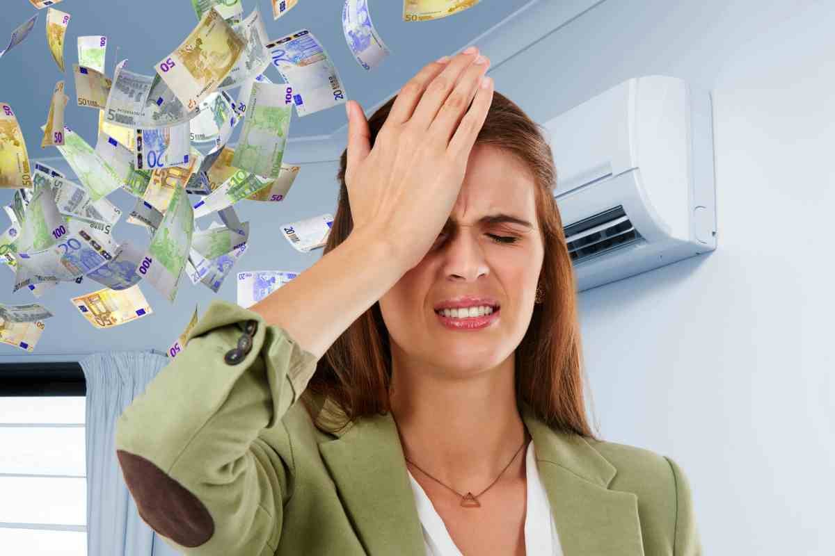 Donna preoccupata, condizionatore e soldi