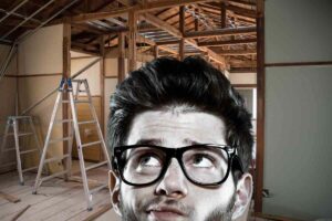 Lavori di ristrutturazione e uomo perplesso