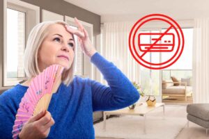 donna con ventaglio sfondo soggiorno e simbolo stop condizionatore