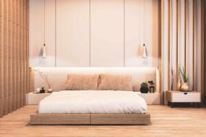 camera da letto arredata in stile japandi con letto basso