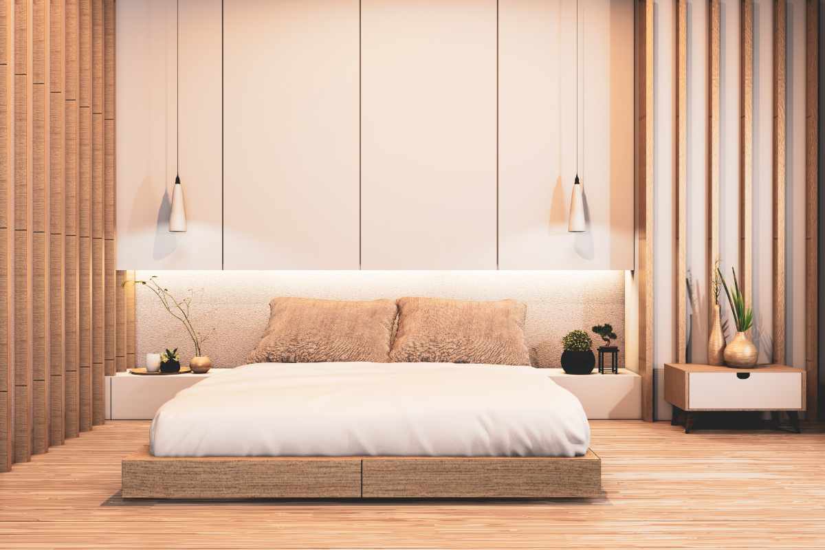camera da letto arredata in stile japandi con letto basso