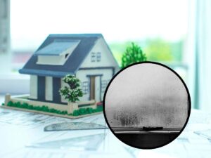 sfondo casetta in miniatura e tondo con vetro opaco
