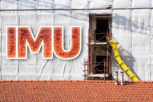 una struttura su cui stanno facendo dei lavori con scritto accanto "IMU"
