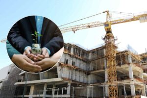 cantiere e mani insieme tengono pianta