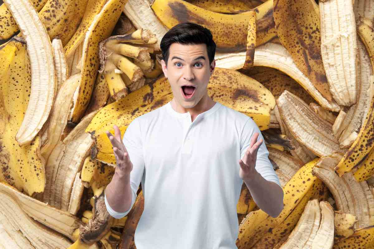 Sfondo con bucce di banana e uomo felice