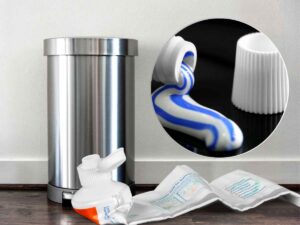 sfondo secchio in primo piano tubetto dentifricio finito