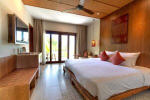 letto struttura legno in hotel