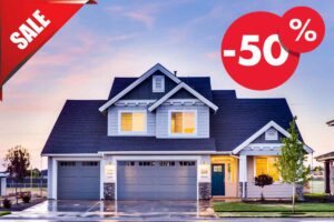 Una casa con una scrita "sale" in alto a sinistra e un insegna del "-50%"