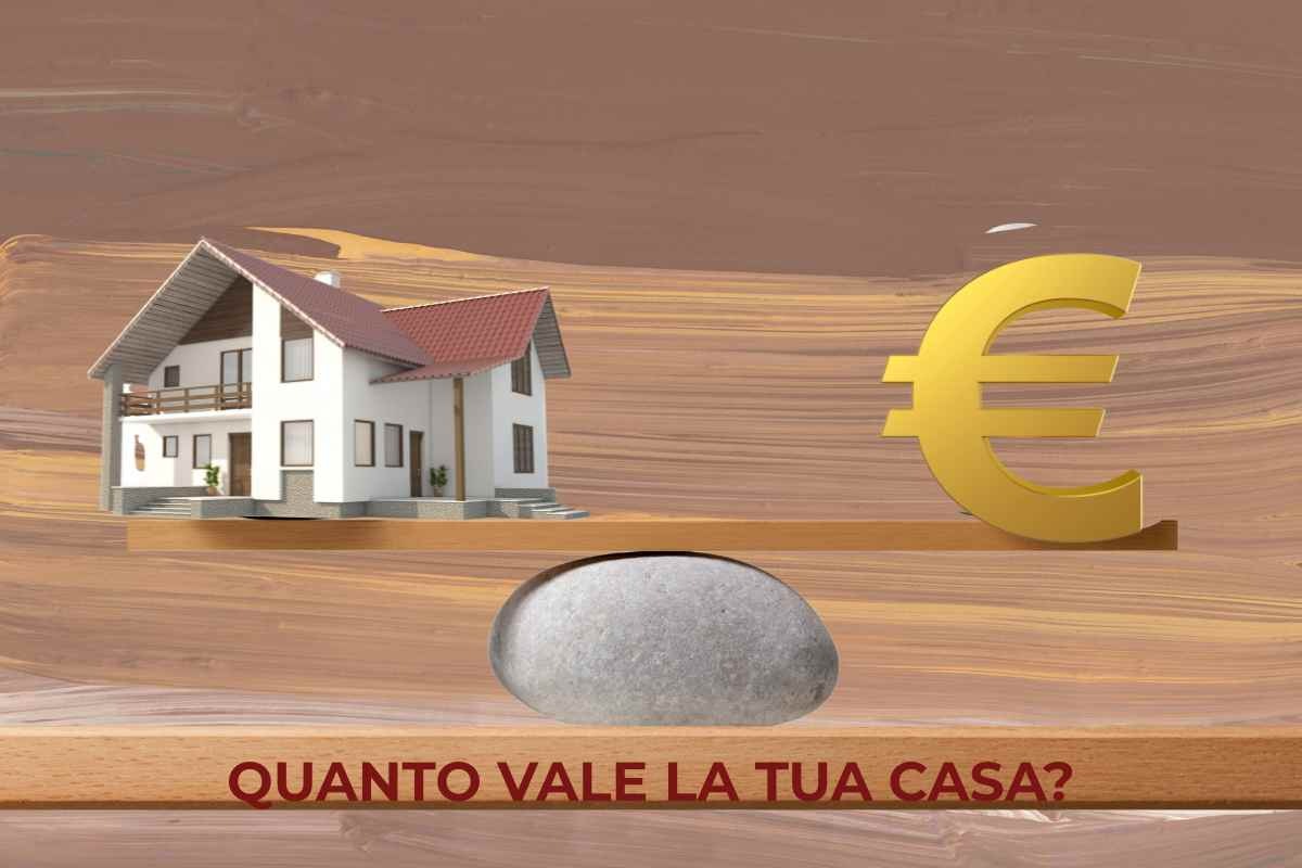 Bilancia con casa ed euro