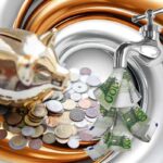 Salvadanaio e rubinetto