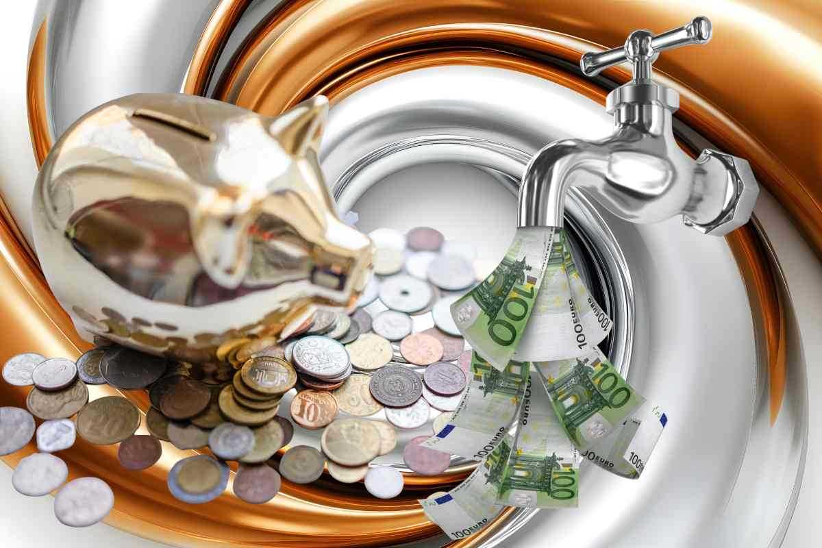 Salvadanaio e rubinetto