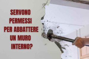 Abbattere un muro e scritta