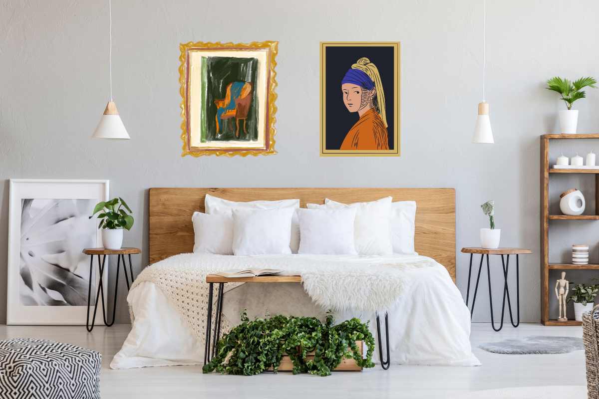Letto con due quadri sulla testiera