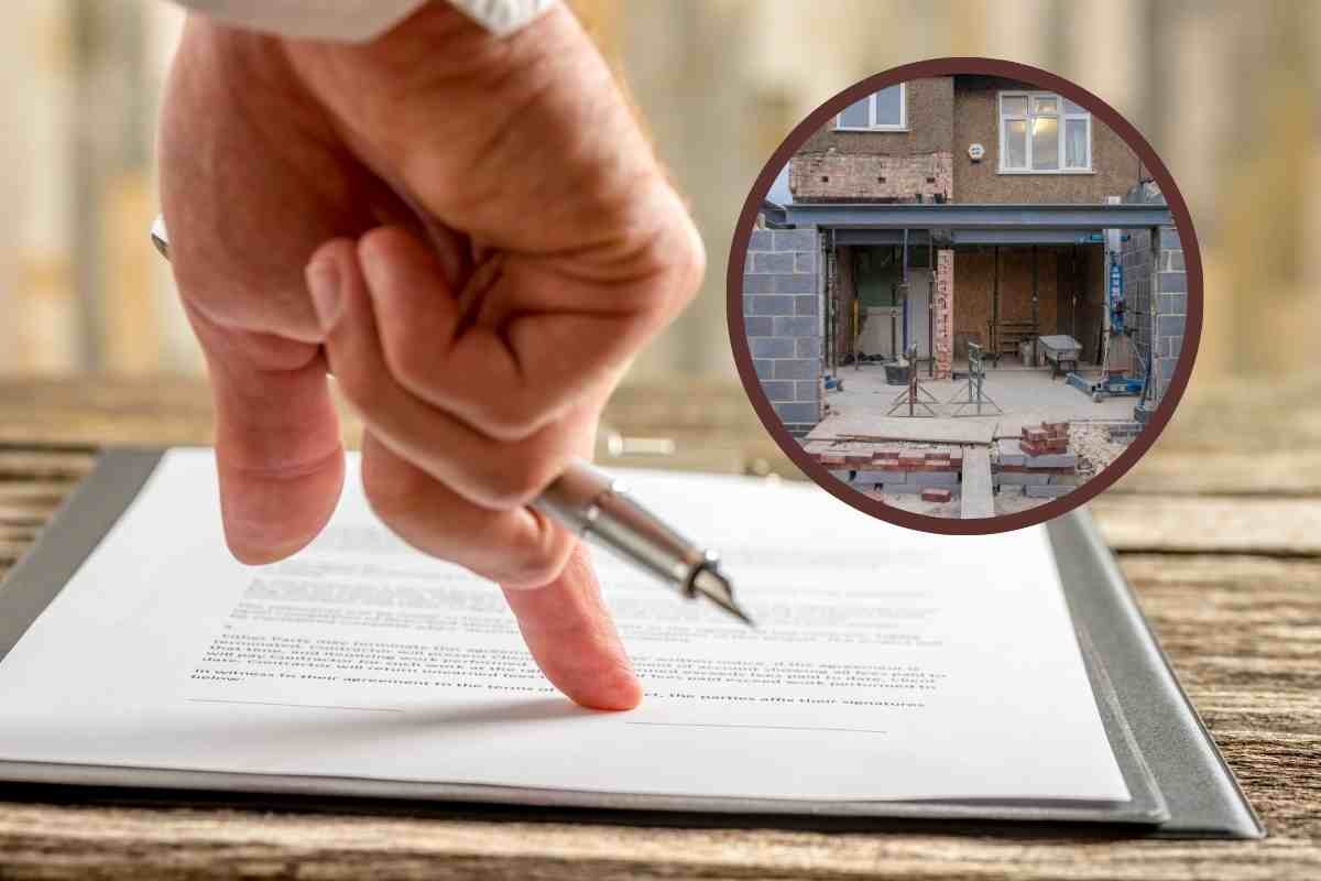 Dito sul foglio e casa rovinata