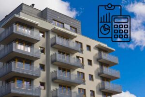 Un condominio grande e dei grafici e una calcolatrice in alto a destra