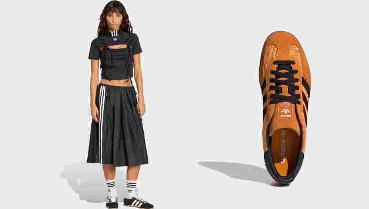 ragazza con look nero e scarpa adidas