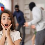 ladri in casa, bandiera francese in icona e donna sorpresa con mani in faccia