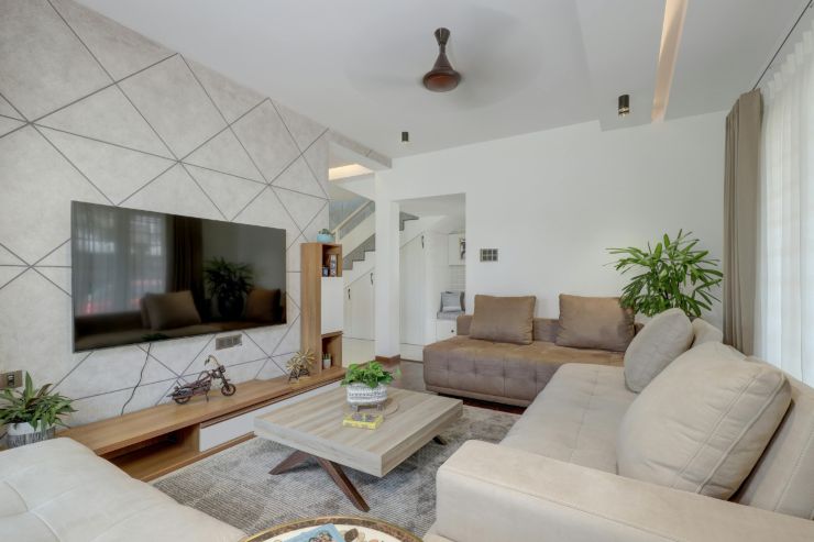 Un salone moderno senza ne camino ne termosifoni sulle pareti