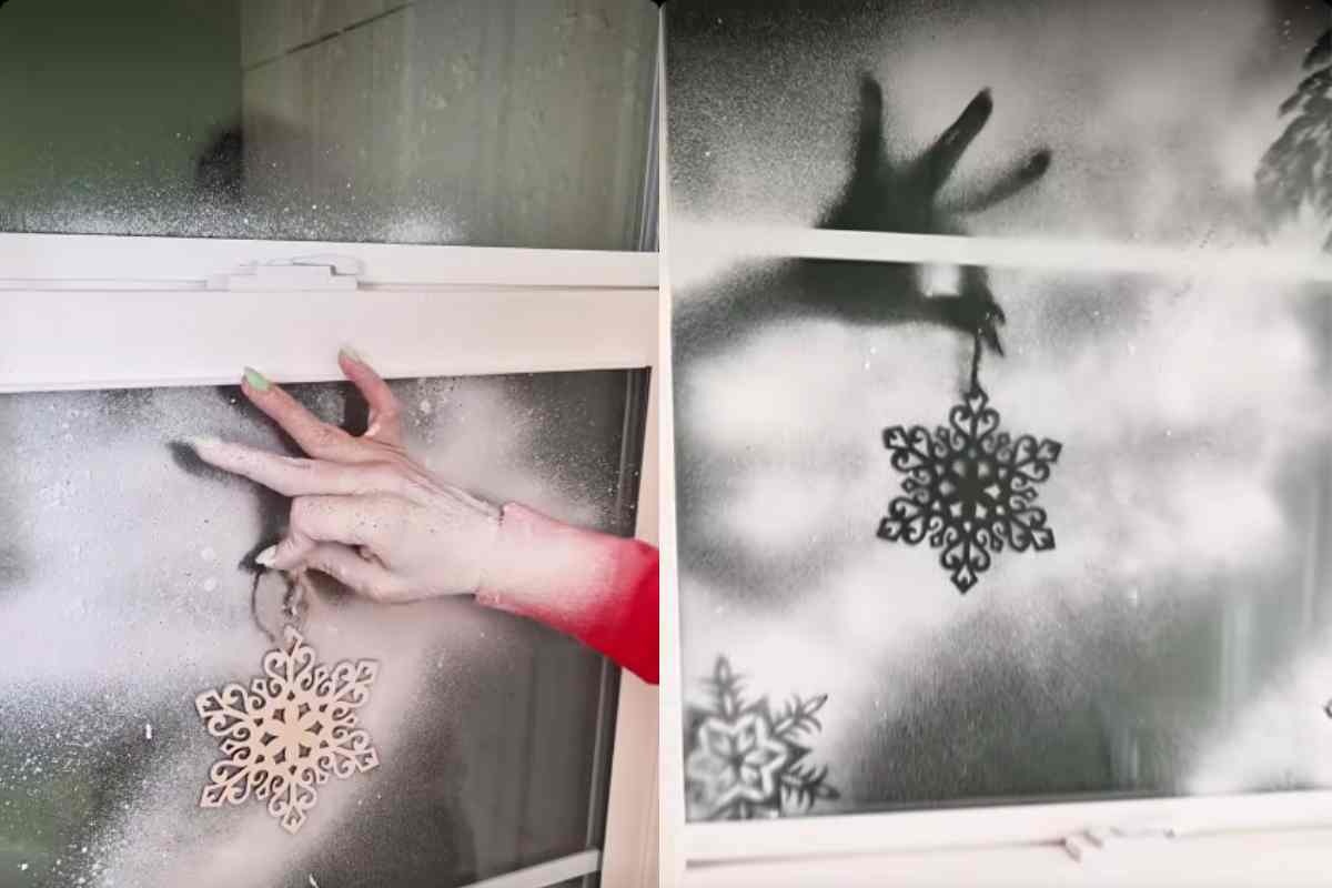 mano con decorazione e spray sulla finestra