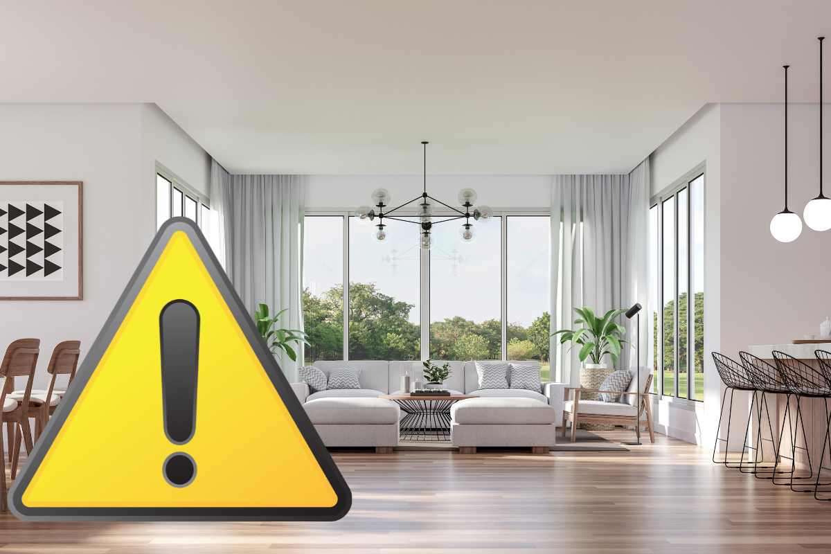 simbolo attenzione e camera da pranzo