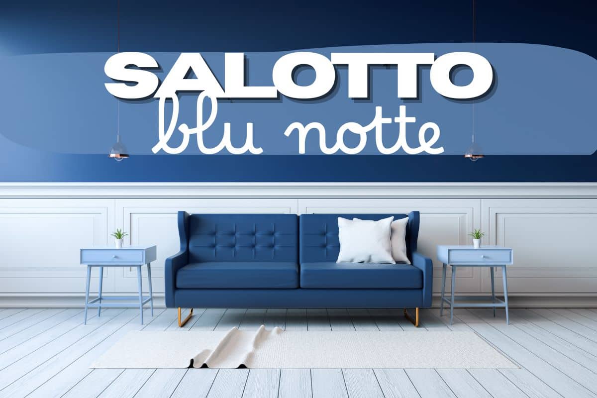 Salotto con divano e parete blu