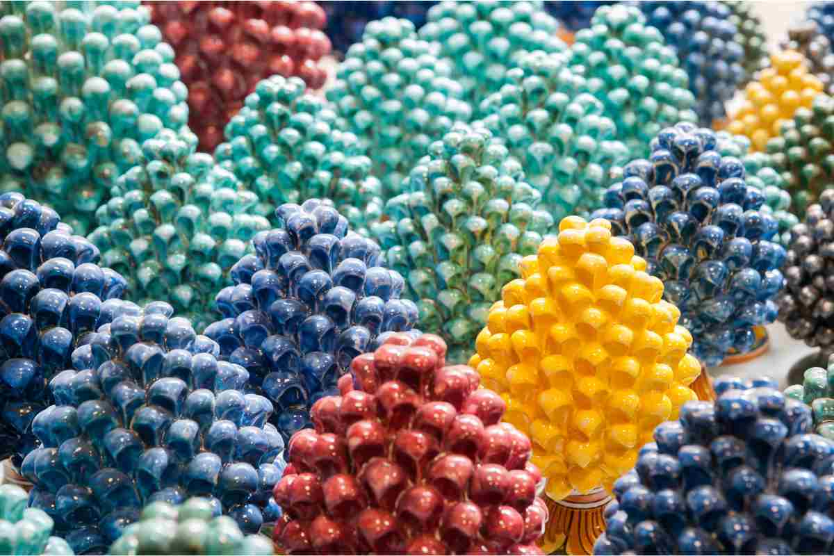 pigne in ceramica portafortuna di diversi colori