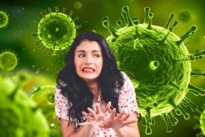 Uno sfondo pieno di germi ed una donna in primo piano schifata