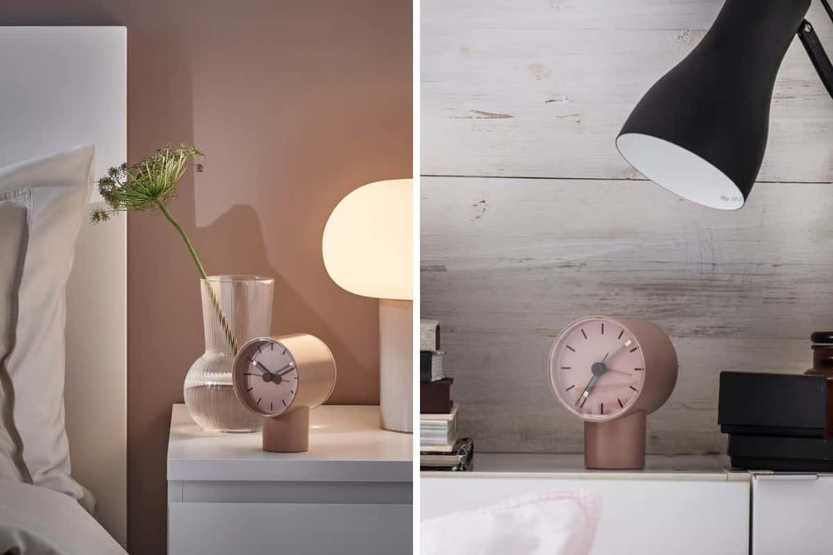 Sveglia analogica rosa sul comodino chiaro
