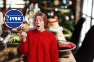 tavola di natale, logo jysk in icona rossa e donna sorpresa