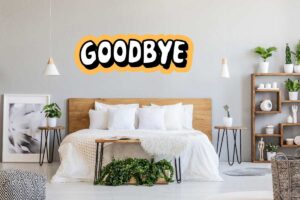 Una camera da letto con sopra una scritta "Goodbye"
