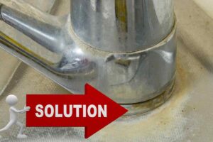 calcare su rubinetto con freccia che l indica in rosso con scritto soluzione