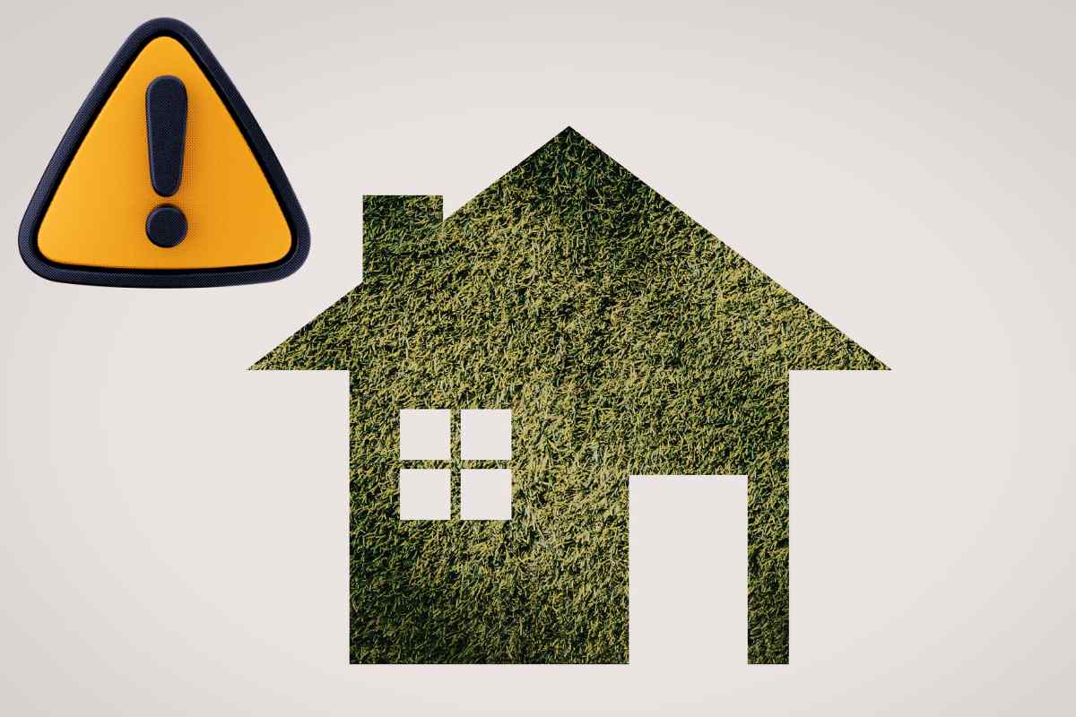 casa verde e simbolo attenzione giallo e nero