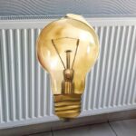 termosifone sullo sfondo e lampadina gialla al centro