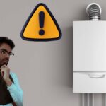 caldaia a parete uomo pensieroso e segnale attenzione