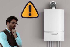caldaia a parete uomo pensieroso e segnale attenzione