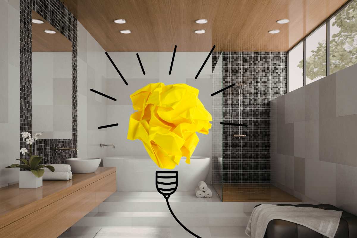 bagno con doccia a filo e lampadina